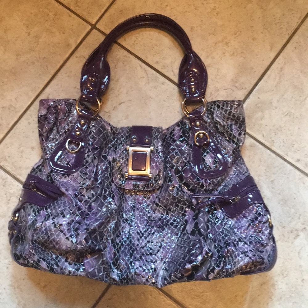 Purple snake skin purse